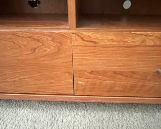 P27 - $10. Media Cabinet. Measures 49" x 21" deep x 21.5" tall. Pressed wood but in good condition!
