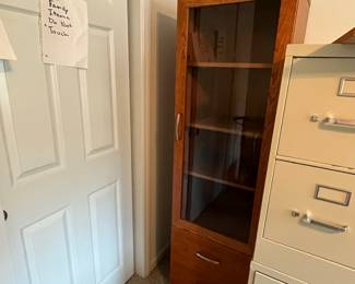 P36 - $40. Palliser Cabinet. Measures 20" wide x 18" deep x 69" tall. Pressed wood in very good condition!