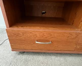 P27 - $10. Media Cabinet. Measures 49" x 21" deep x 21.5" tall. Pressed wood but in good condition!