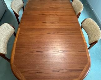 P4 - $275. Table Only! Edward Valentinsen. Drylund Dining Table. Has 2 leaves that store inside/under the table when not in use. Measures 41" wide x 63" long x 27.5" tall. Each leaf adds 18.75". One leaf has minor surface damage and one ring on the top where it looks like a plant was left.