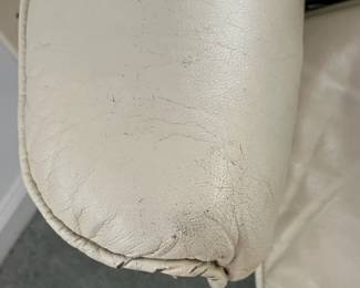 P6 - $75. Unico Denmark Chair and Ottoman. Ottoman is in good condition measures 20" wide x 15" x 15" tall. Chair is in *rough* condition. Leather is good and not torn but the frame needs some serious work. Measures 30.5" wide x 37" deep x 33" tal.