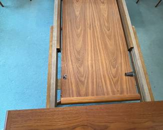 P4 - $275. Table Only! Edward Valentinsen. Drylund Dining Table. Has 2 leaves that store inside/under the table when not in use. Measures 41" wide x 63" long x 27.5" tall. Each leaf adds 18.75". One leaf has minor surface damage and one ring on the top where it looks like a plant was left.