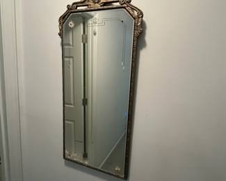 P44 - $75. Antique Wall Mirror by Boston Mirror Co. Measures 17" x 35" tall.
