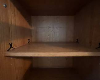 P36 - $40. Palliser Cabinet. Measures 20" wide x 18" deep x 69" tall. Pressed wood in very good condition!