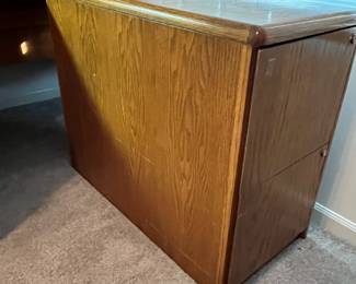 P38 - $20. Oversized wooden filing cabinet. No keys. Measures 16" wide x 36" deep x 29" tall. Built to look like a console table from the side.