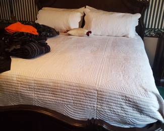 King-size headboard/footboard ( coverlet stay with homeowner)
