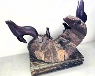 Handcrafted Ironwood Sculpture on wheels