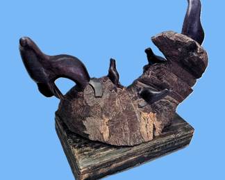 One-of-a-Kind Handcrafted Ironwood Sculpture on wheels.