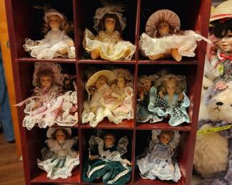Doll Ornaments in display case, all sold as 1