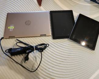 HP computer and 2 Apple i pads