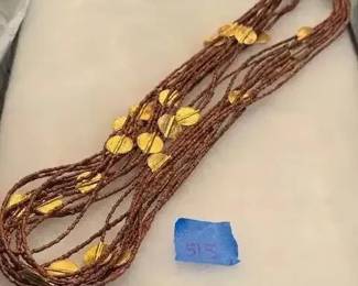 MS515Unique bead and gold tone costume necklace