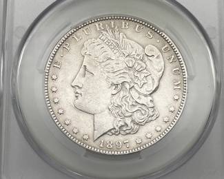 1897-O Morgan Dollar, graded AU Details by CAC. Harshly Cleaned.