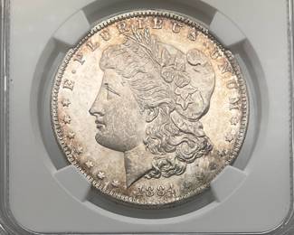 1884-O Morgan Dollar, graded MS 63 Proof Like by Numismatic Guaranty Company.