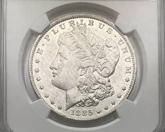 1885-O Morgan Dollar, graded MS 62 by Numismatic Guaranty Company.