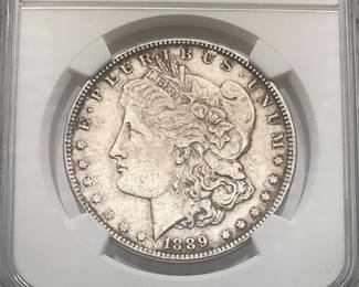 1889 Morgan Dollar, graded MS 61 by Numismatic Guaranty Company.