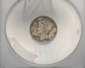 1917 Mercury Dime, graded AU 58 Details by ANACS. Cleaned.