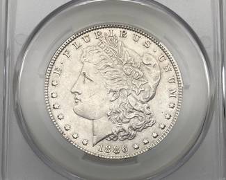 1886 Morgan Dollar, graded AU 58 by CAC.