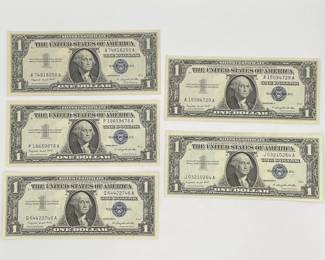 Five 1957 A $1 Silver Certificates. Cataloged as Fr. 1620.