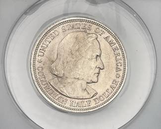 1893 Columbian Exposition Half Dollar commemorating the 400th anniversary of Christopher Columbus's arrival in the Americas. Graded MS 63 by ANACS.