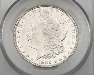 1892 Morgan Dollar, graded XF Details by CAC. Harshly Cleaned.