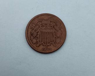 1864 US 2 Cent Piece. The first US coin to carry the motto "In God We Trust". First year of production.
