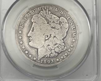 1893 Morgan Dollar, graded VG Details by CAC. Harshly Cleaned.