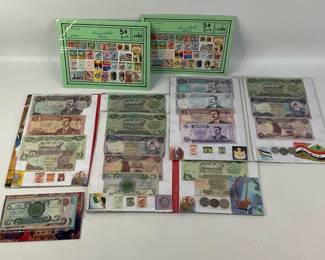 Collection of (3) folders of Iraqi money and (1) envelope of bills with (2) stamp collections. See photos for details.