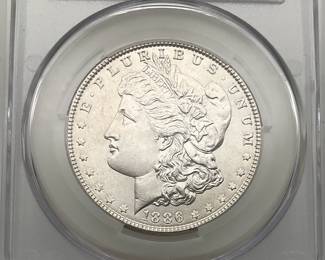 1886 Morgan Dollar, graded AU 58 by CAC.