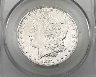 1883-S Morgan Dollar, graded XF Details by CAC. Harshly Cleaned.