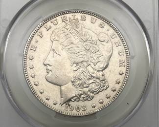 1903 Morgan Dollar, graded AU Details by CAC. Cleaned.