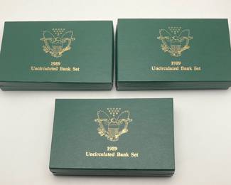 Three 1989 uncirculated bank sets, two Philadelphia and one Denver
