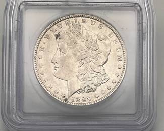 1897-O Morgan Dollar, graded AU 55 by ICG.