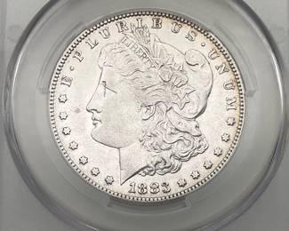 1883-S Morgan Dollar, graded AU Details by CAC. Cleaned.