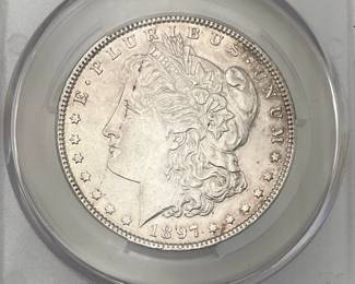1897 Morgan Dollar, graded AU Details by CAC. Cleaned.