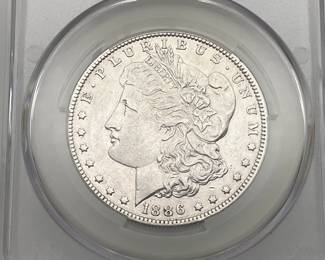 1886-O Morgan Dollar, graded XF Details by CAC. Cleaned.