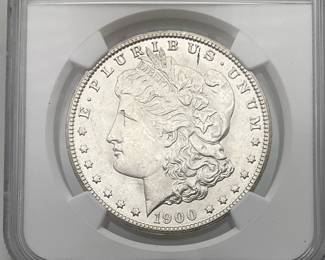 1900-O Morgan Dollar, graded MS 62 by Numismatic Guaranty Company.