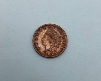 #198 • 1863 Civil War Token
High bid $6
1863 Civil War Token. Fuld 82/352. Indian head obverse. Open wreath enclosing cannons, drum, flags, liberty cap reverse. Condition as Shown.