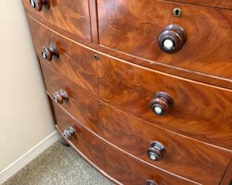 This is American Empire flame-mahogany veneer chest of drawers
$950