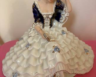 This is a vintage Royal Dux porcelain figurine of a seated woman reading a book.
1940 $150. Call Donna 850-516-2425