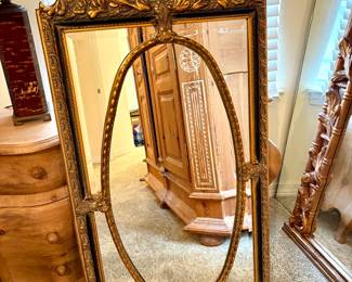 #2 Gold and Black Oval Rectangle Mirror 47”H X 24” W $300 Call Donna 850-516-2425