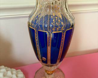 This is a vintage Bohemian Moser vase in clear glass with gilded decoration and raised ultramarine blue glass panels. 1,500. Call Donna 850-516-2425