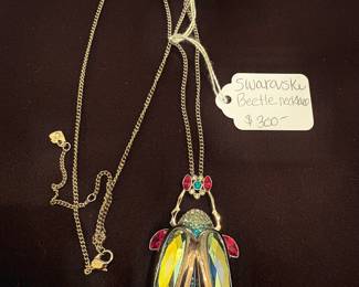 Swarovski Beetle Necklace $300
Call Donna 850-516-2425