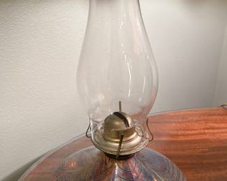 This is an iridescent art glass oil lamp or kerosene lantern. $150
Call Donna 850-516-2425