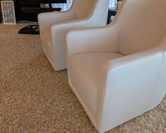 Italian Leather Swivel Chairs purchased new. With upkeep insurance.