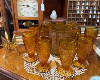 Vintage amber pitcher and glasses would add a touch of class to any dining table