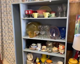 Lots of serving pieces, cups, mugs