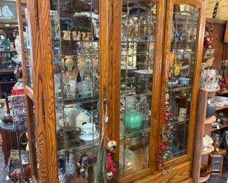 Curio cabinet filled with items