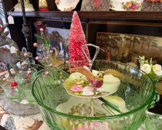 green glass bowl, red bottle brush trees