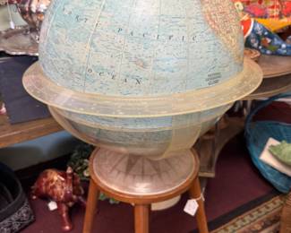 Vintage 1963 National Geographic 16” globe on stand features light blue ocean cartography style