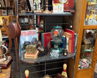vintage bowling pins, nut dispenser, mantle clock, statuary, coffee table book